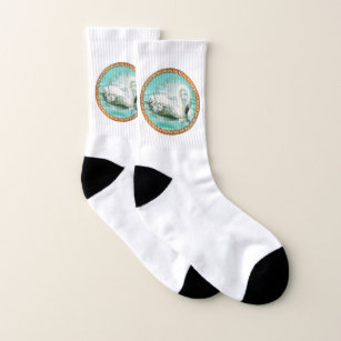 Beautiful white swan in a turquoise blue water socks