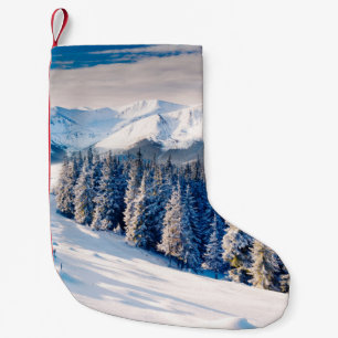 Beautiful winter landscape with snow covered trees small christmas stocking