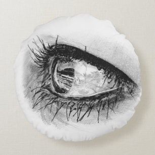 Beautiful woman eye in mascara on round pillow