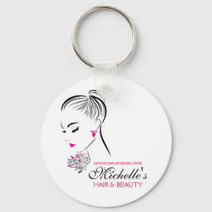 Beautiful woman with pink earrings branding key ring