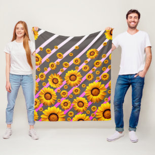 Beautiful yellow flowers on grey, pink stripes fleece blanket