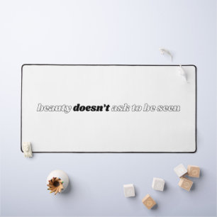 Beauty Doesn't Ask Desk Mat
