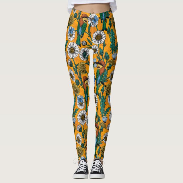 Bee-eaters, blue butterflies and daisies on orange leggings (Front)