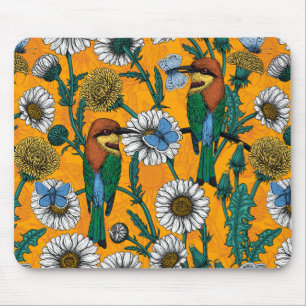Bee-eaters, blue butterflies and daisies on orange mouse mat