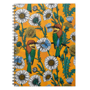 Bee-eaters, blue butterflies and daisies on orange notebook