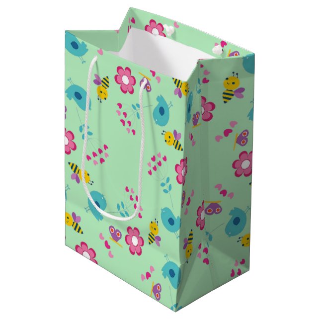 Bees, birds and flowers green pattern medium gift bag (Front Angled)