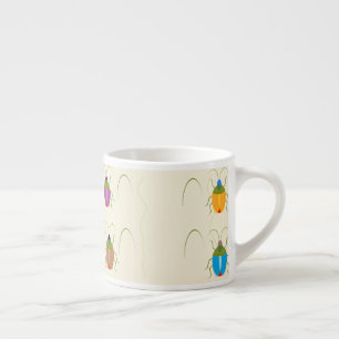 Beetle on brown soil espresso cup