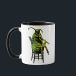 Beetlejuice | Beetle in Chair Mug<br><div class="desc">Beetlejuice Bugs Out... On Your Stuff! Remember Beetlejuice's most buggin' introduction? Now you can own a piece of that scene with our exclusive design featuring Beetlejuice in all his human-sized beetle glory, perched on a chair and casually asking, "Hi, how are ya?" It's the perfect conversation starter (or maybe ender,...</div>