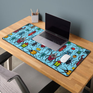 Beetles on blue desk mat
