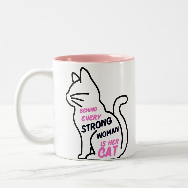 Behind every strong woman is her cat Two-Tone coffee mug (Left)