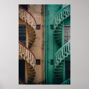 Beige and green concrete spiral stairs beside buil poster