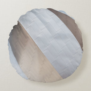 Beige and white surface round cushion