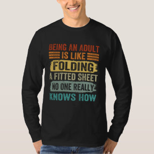 Being An Adult Is Like Folding A Fitted Sheet 2 T-Shirt