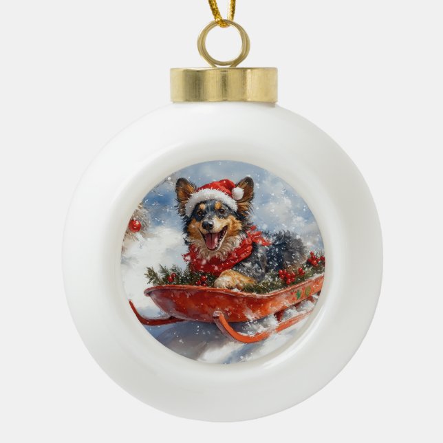 Belgian Shepherd in Sledge Let it Snow Christmas Ceramic Ball Christmas Ornament (Front)
