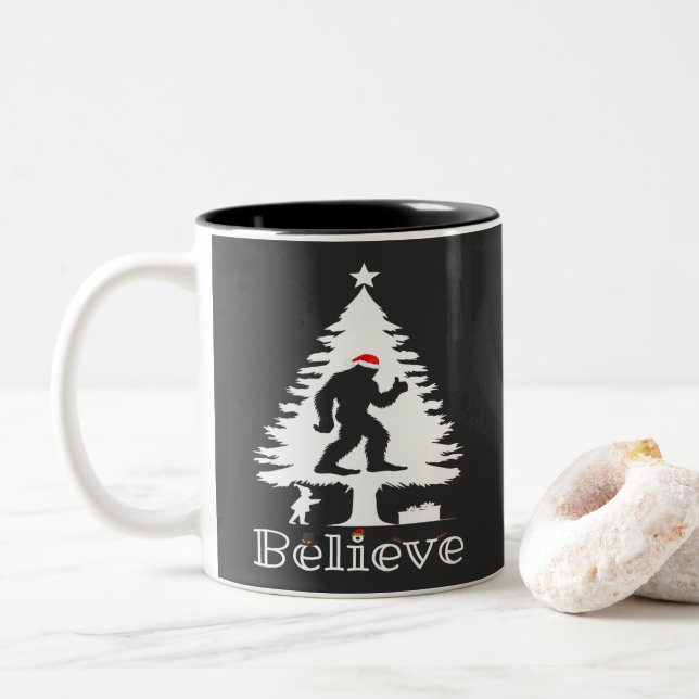 Believe Bigfoot Cryptozoology Christmas Tree Two-Tone Coffee Mug (With Donut)