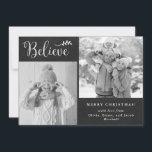 Believe | Chalkboard Christmas Photo Collage Holiday Card<br><div class="desc">This trendy and rustic holiday card says "Believe" in chalk white coloured handwritten script,  with a matching botanical Christmas branch. Add two of your favourite personal photos onto the black,  chalkboard look background. The back of the card has a black and white gingham plaid pattern.</div>