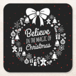 Believe in Christmas Chalkboard Holiday Wreath Square Paper Coaster<br><div class="desc">Cute black and white Christmas wreath made up of classic Christmas holiday icons, including gingerbread men, Christmas trees, candy canes, snowflakes, ornaments, gifts, and other holiday symbols with a bow at the top. Reads 'Believe in the Magic of Christmas' in whimsical text in the centre with scattered red stars on...</div>