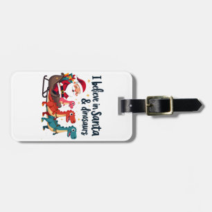 believe in Santa and dinosaurs (Santa riding dinos Luggage Tag