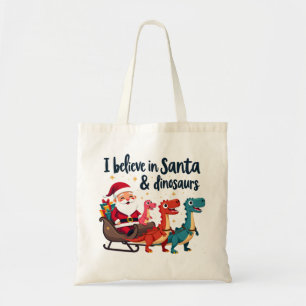 believe in Santa and dinosaurs (Santa riding dinos Tote Bag