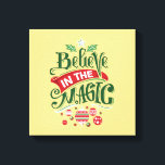 Believe in the Magic Christmas Typography Canvas Print<br><div class="desc">Canvas print with a cool illustration. Text says Believe in the Magic in fancy lettering. Decorated with christmas balls.</div>