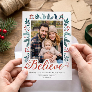 Believe Script Festive Holly Berries Pine Photo Holiday Card