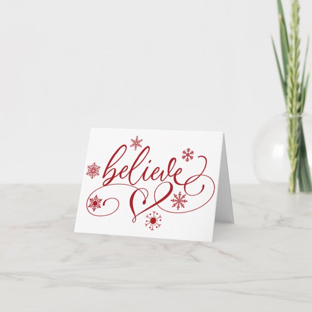 Believe Script | Red Christmas Snowflake Flourish Holiday Card (Front)