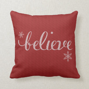Believe snowflake typography cushion