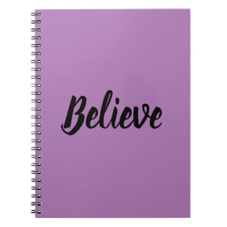 Believe typography in black purple background notebook