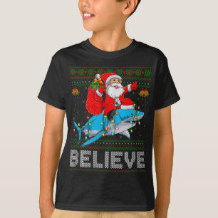 Believe Xmas Funny Santa Riding Shark Ugly Christm T-Shirt