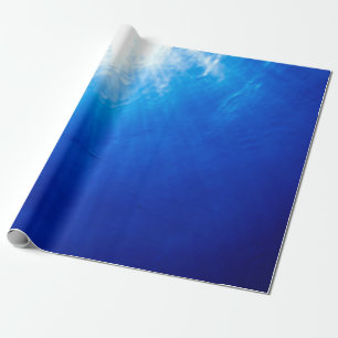 Below beneath blue deep dive wrapping paper