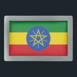 Belt Buckle with Flag of Ethiopia<br><div class="desc">This eye-catching belt buckle featuring the Flag of Ethiopia is a bold statement piece that adds a patriotic touch to any outfit. Showcasing the vibrant green, yellow, and red colours with the iconic emblem at the centre, this belt buckle is perfect for those who take pride in Ethiopia’s rich history...</div>