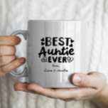 "Best Auntie ever" with personalised kids names Coffee Mug<br><div class="desc">A collection of gifts such as mugs, tote bags and tshirts for the best auntie ever, which are also great for pregnancy announcements for your sister. The collection features a variety of different slogans including: “Blessed Auntie”, “Promoted to Auntie”, “Aunt Vibes”, “I’m the favourite aunt”, “Aunt, like a mum only...</div>