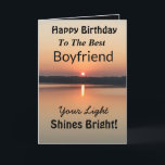 Best Boyfriend Your Light Shines Bright Birthday Card<br><div class="desc">Express your love to your boyfriend on an inspirational sunset birthday card with the verse “Your Light Shines Bright”. The minimal design is modern with bold colours of gold and black showing glowing water and a peaceful lake.</div>
