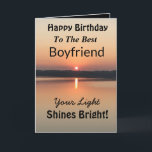 Best Boyfriend Your Light Shines Bright Birthday Card<br><div class="desc">Express your love to your boyfriend on an inspirational sunset birthday card with the verse “Your Light Shines Bright”. The minimal design is modern with bold colours of gold and black showing glowing water and a peaceful lake.</div>