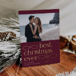 Best Christmas Ever Engagement Photo Foil Holiday Card<br><div class="desc">Share the news of your holiday season engagement with these elegant and festive engagement announcement cards featuring a single horizontal or landscape orientated photo with "best Christmas ever" beneath in gold foil lettering on a rich holiday plum background. Personalise with your announcement (shown with "we're engaged") and names beneath, and...</div>