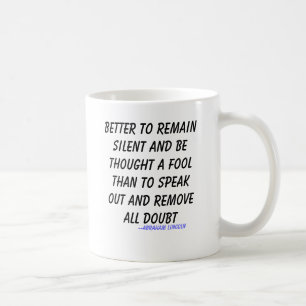 Better to remain silent and be thought a fool t... coffee mug