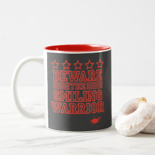 Beware the Smiling Warrior Red Gfx Two-Tone Coffee Mug
