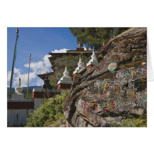 Bhutanese writing on rocks and Nepalese chortens