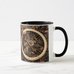 Bicycle parts with autumn leaves coffee cup