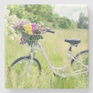 Bicycle with Basket of Flowers in the Meadow Stone Coaster