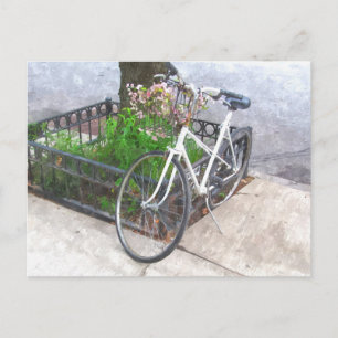 BICYCLE WITH BASKET OF FLOWERS POSTCARD
