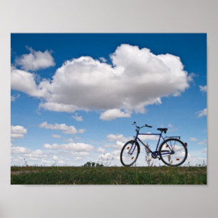 Bicycle with clouds and blue sky poster