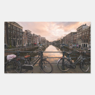 Bicycles at sunset in Amsterdam Rectangular Sticker
