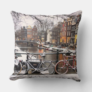Bicycles in the snow in Amsterdam Cushion