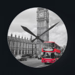 Big Ben London Round Clock<br><div class="desc">A red double decker bus passing in front of the Big Ben clocktower in London England.</div>