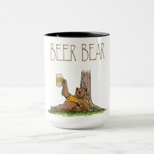 big brown leaning on a tree holding bear glass mug