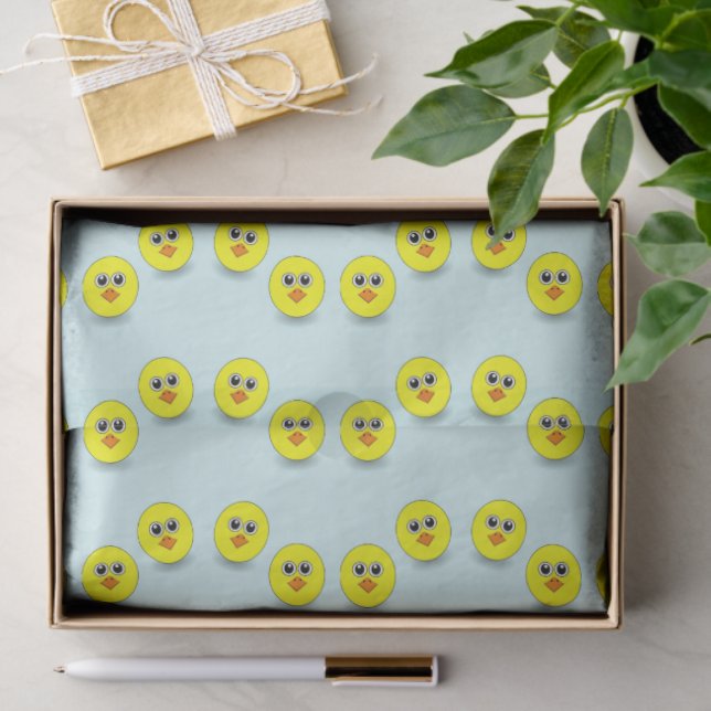 Big head chick on blue tissue paper (Gift)