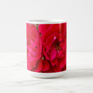 Big red roses in the garden coffee mug