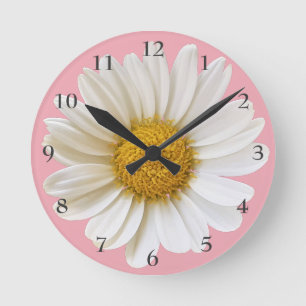 Big White Daisy on Pink Background Round Clock