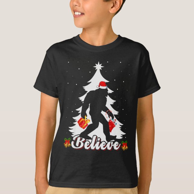 Bigfoot Believe Christmas Tree Funny Santa Sasquat T-Shirt (Front)